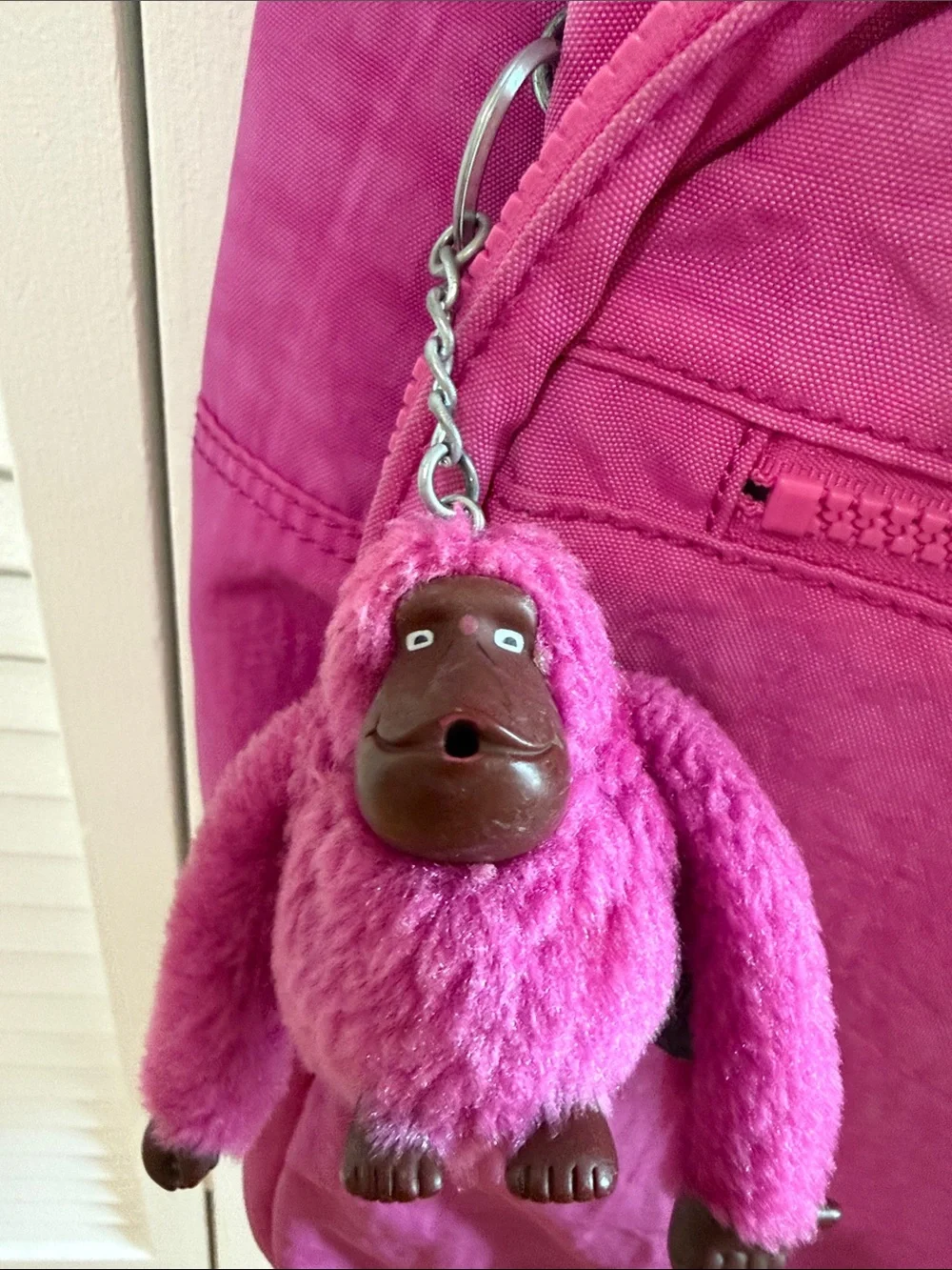 Kipling Bright Pink Kids Backpack with Monkey Charm